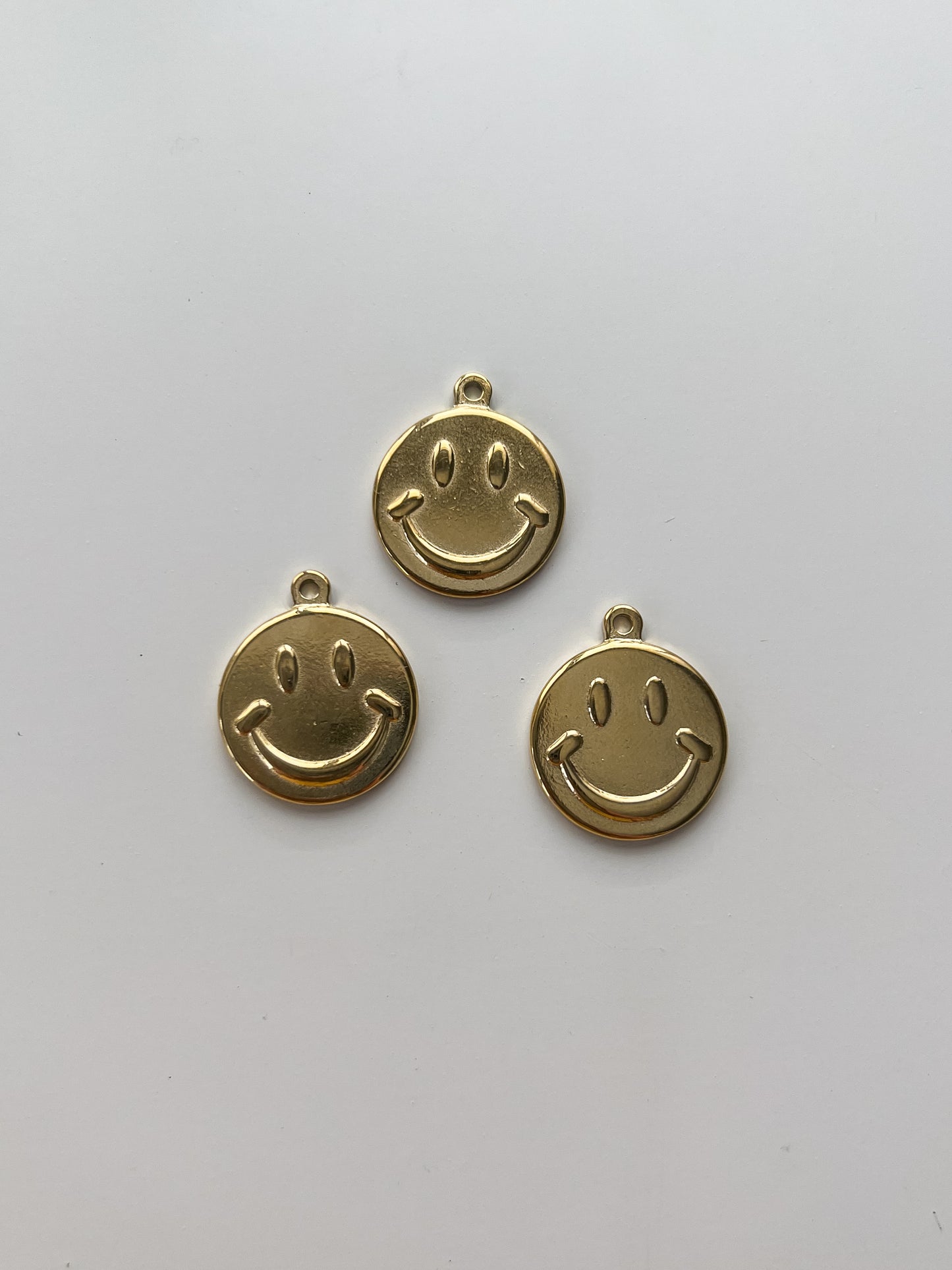 Happy face charm